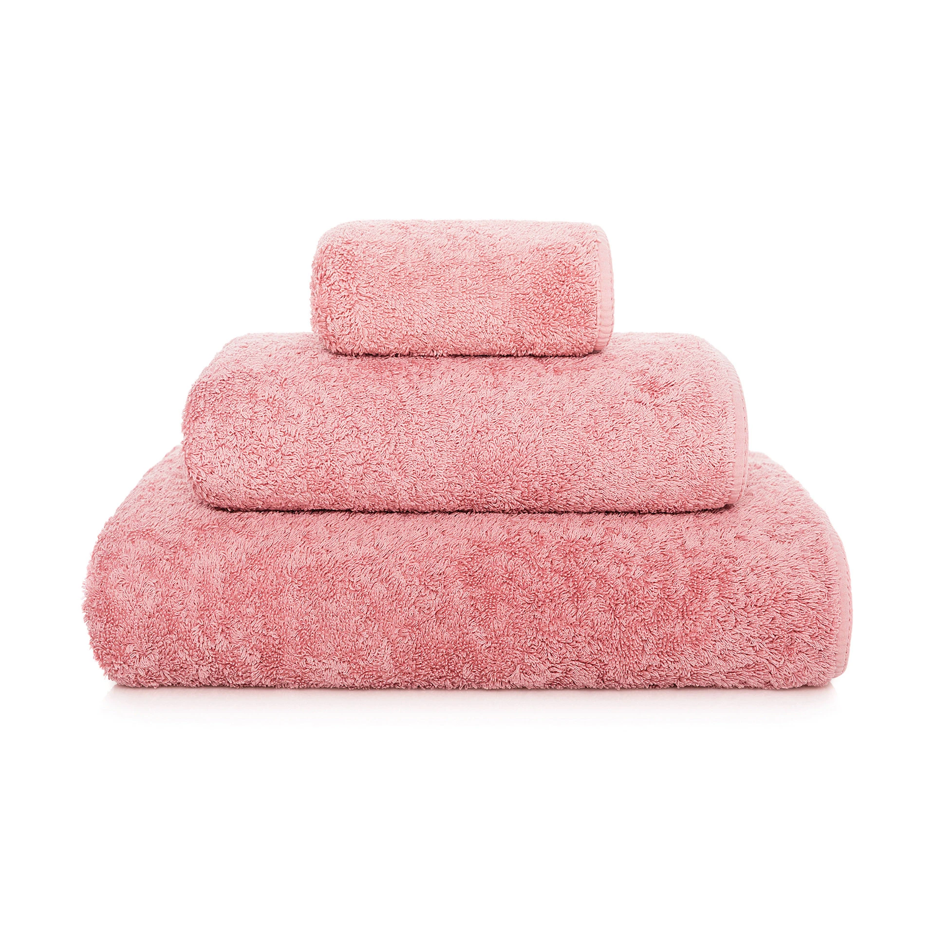 Exklusiva, staplade frottéhanddukar Graccioza Heritage i den subtilt dovrosa färgnyansen Blush fotograferade framifrån.